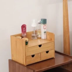 Merkloos Decopatent® Luxe Make-up Organizer Met 3 Lades - Cosmetica Organizer Make Up Met Schuiflade Bamboe Hout - Cosmeticahouder - Toren 12 Merkloos Decopatent® Luxe Make-up Organizer Met 3 Lades - Cosmetica Organizer Make Up Met Schuiflade Bamboe Hout - Cosmeticahouder - Toren -Modecosmetica 1200x1200 147